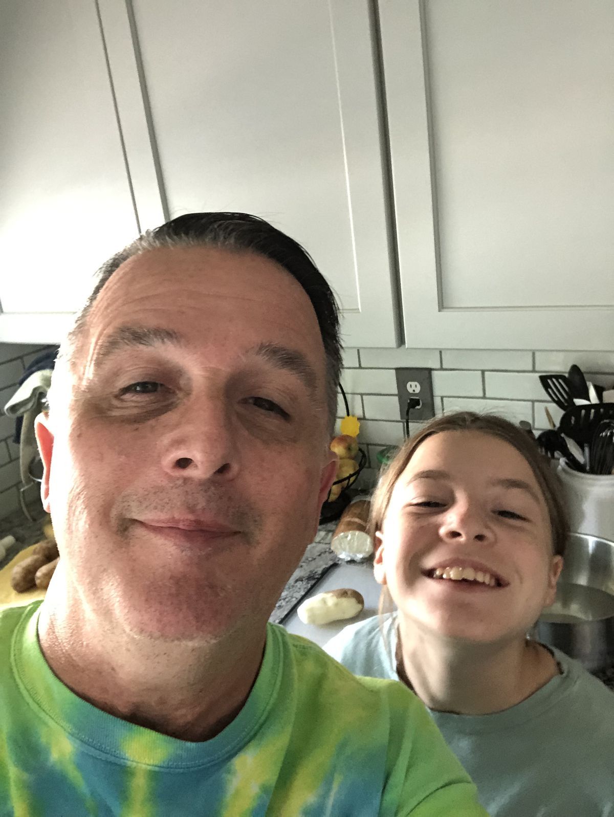 Colene Martin cooking in the kitchen with his daughter