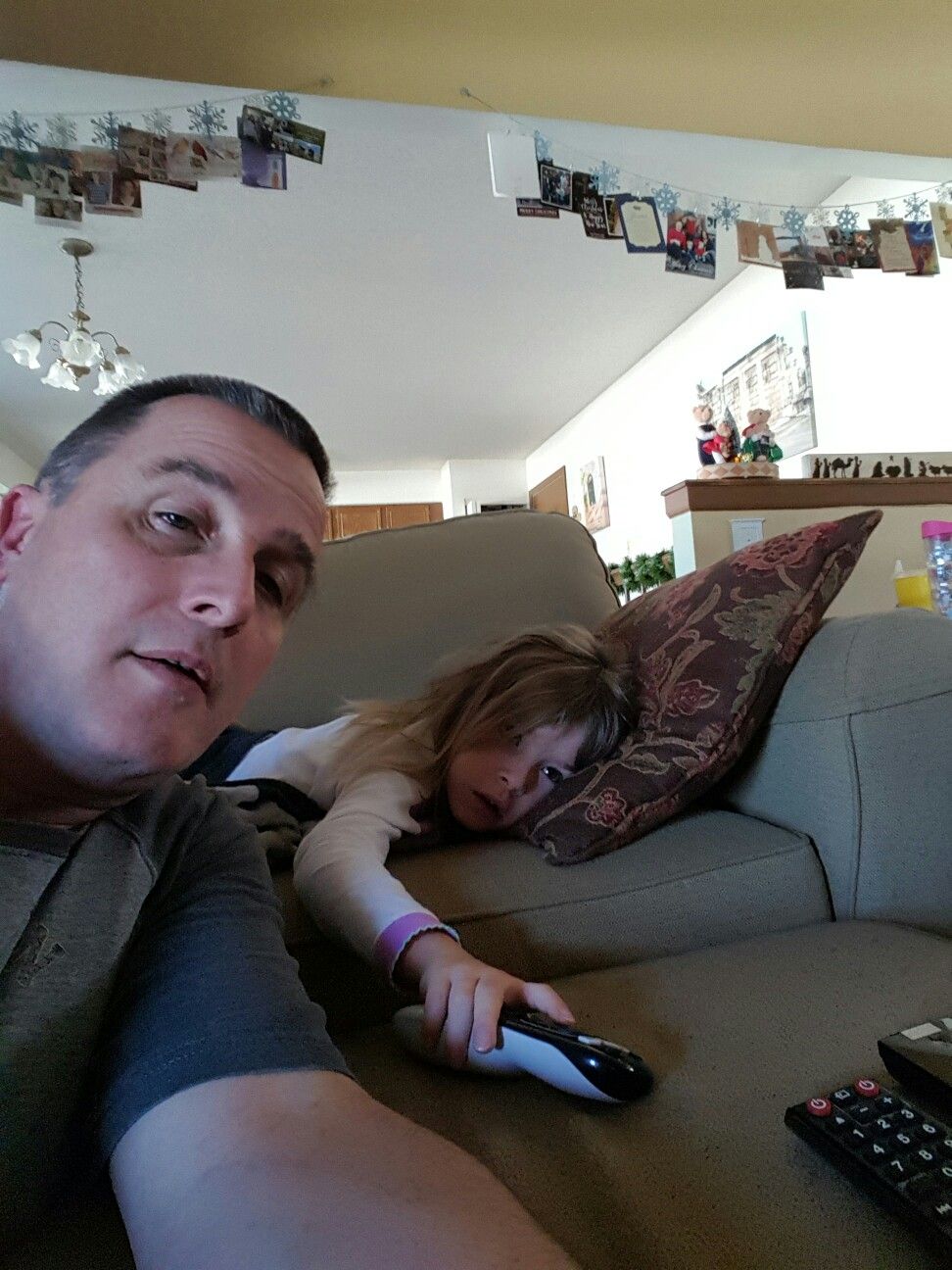 Colene Martin relaxing at home with his daughter