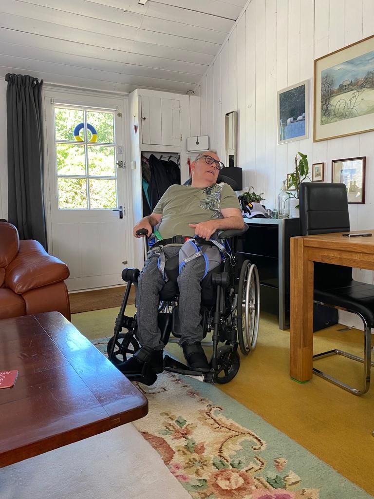 Daniel Anderson in the living room of his Leeds home
